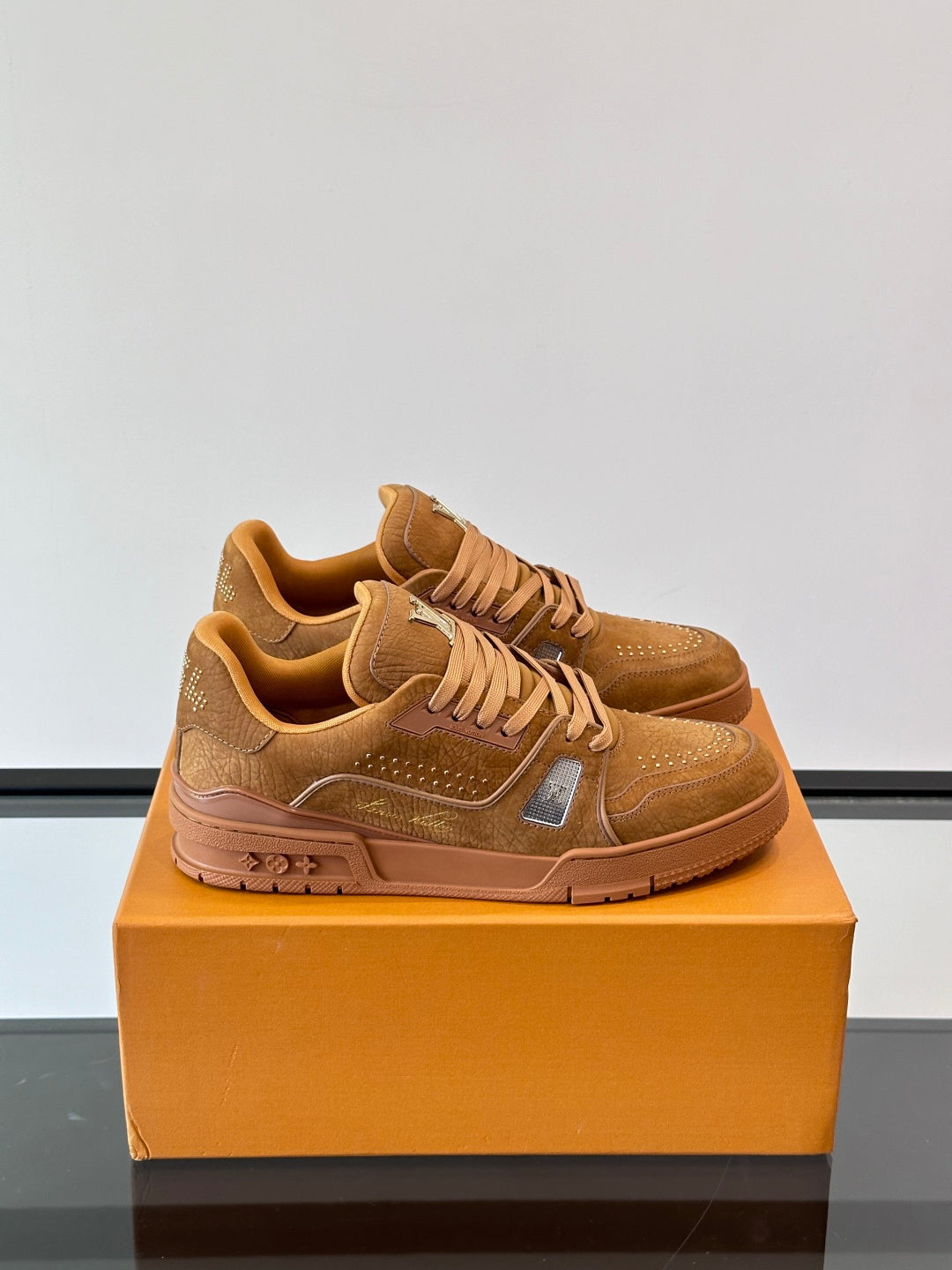 Studded Grain Leather Sneakers with Monogram Outsole