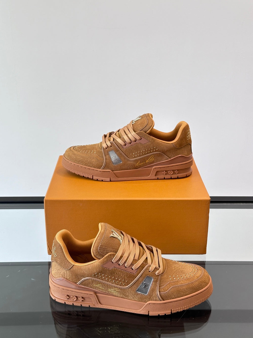 Studded Grain Leather Sneakers with Monogram Outsole