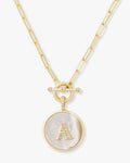 Personalized gold initial medallion necklace with mother of pearl