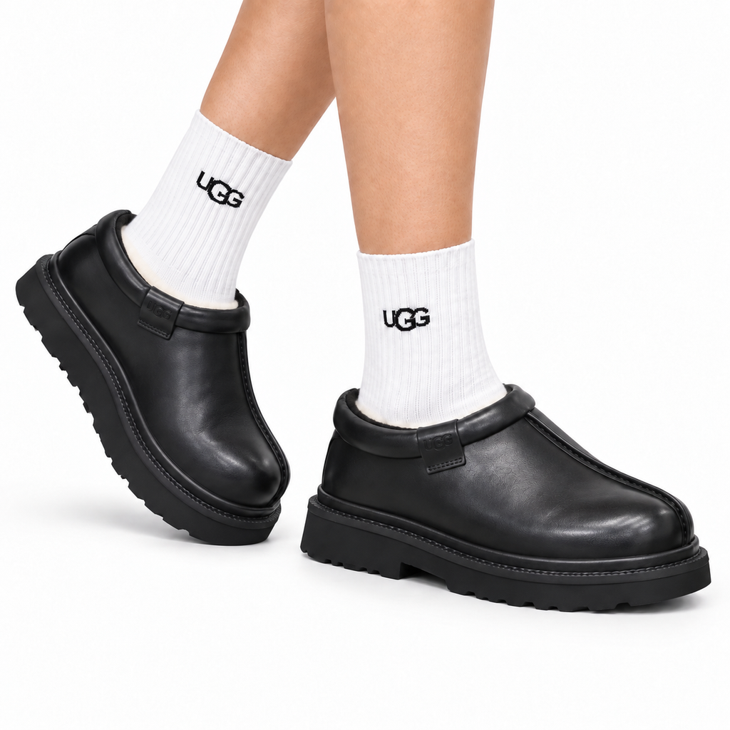 UGG Black Leather Slip-On Casual Shoes - side-angle hero view