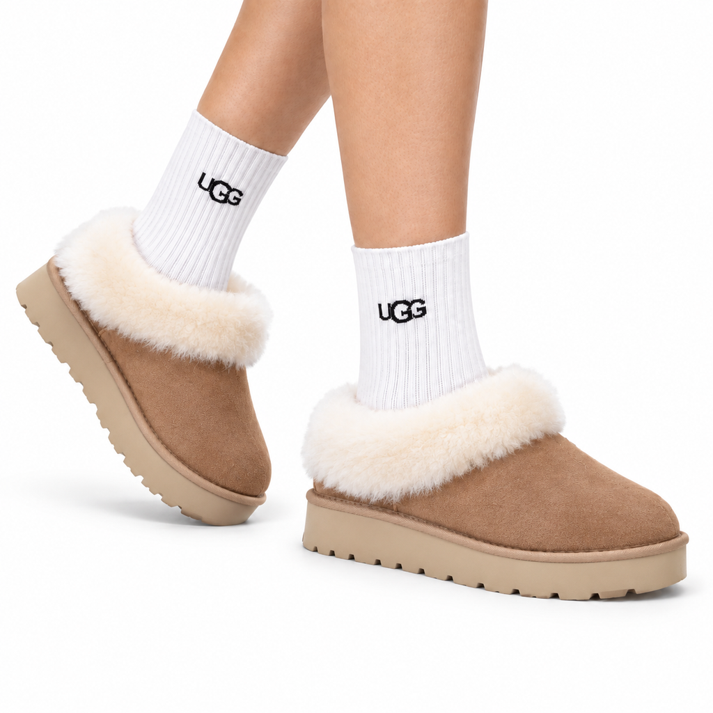 UGG Dakota Shearling Slip-On Shoes - side-angle hero image