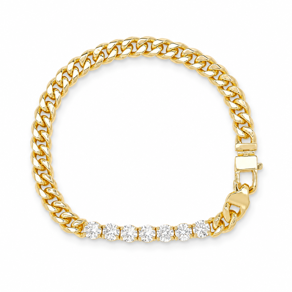 Gold Cuban link bracelet with seven simulated diamonds on a white background