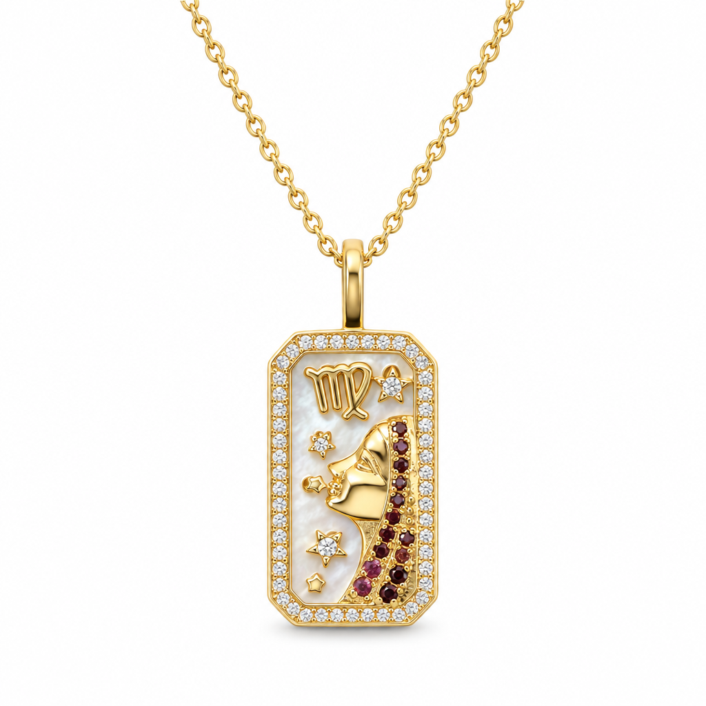 Gold zodiac amulet necklace with mother of pearl and simulated diamonds on a white background