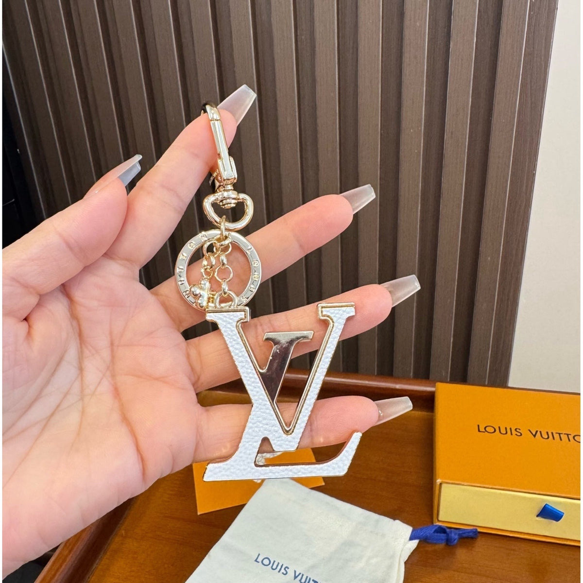 Louis Vuitton Brass Flower Bag Charm Keychain detail 1