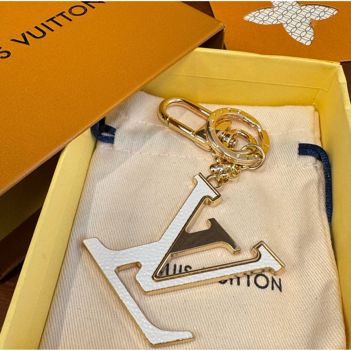 Louis Vuitton Brass Flower Bag Charm Keychain detail 5