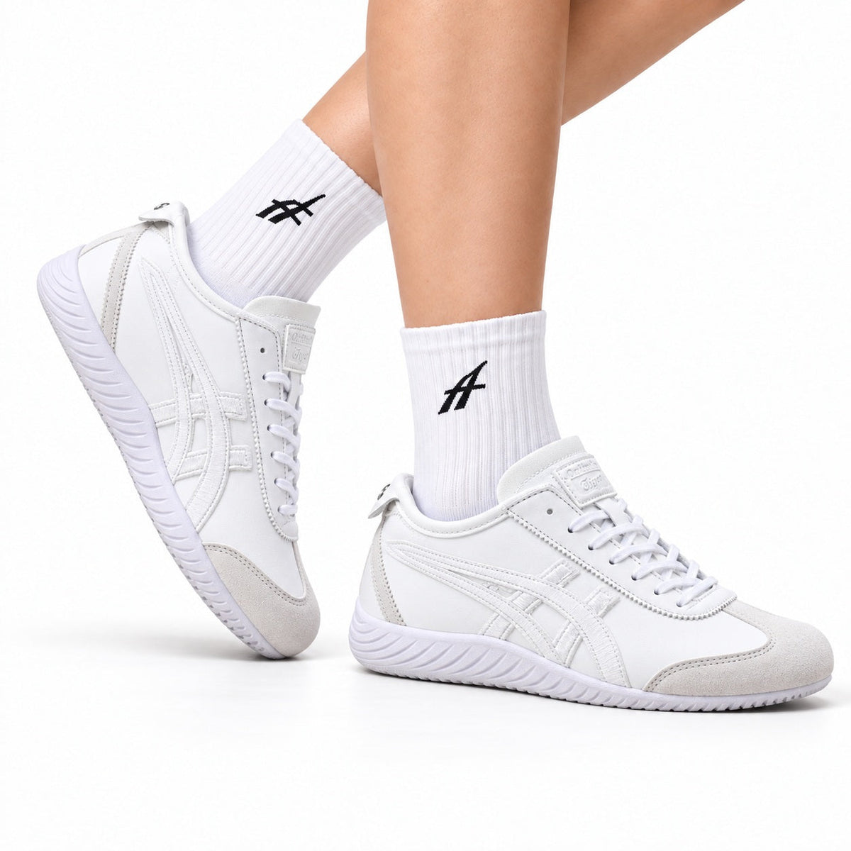 Onitsuka Tiger Low Profile Runner White Tonal Unisex Shoes Style 35 main angled pair view